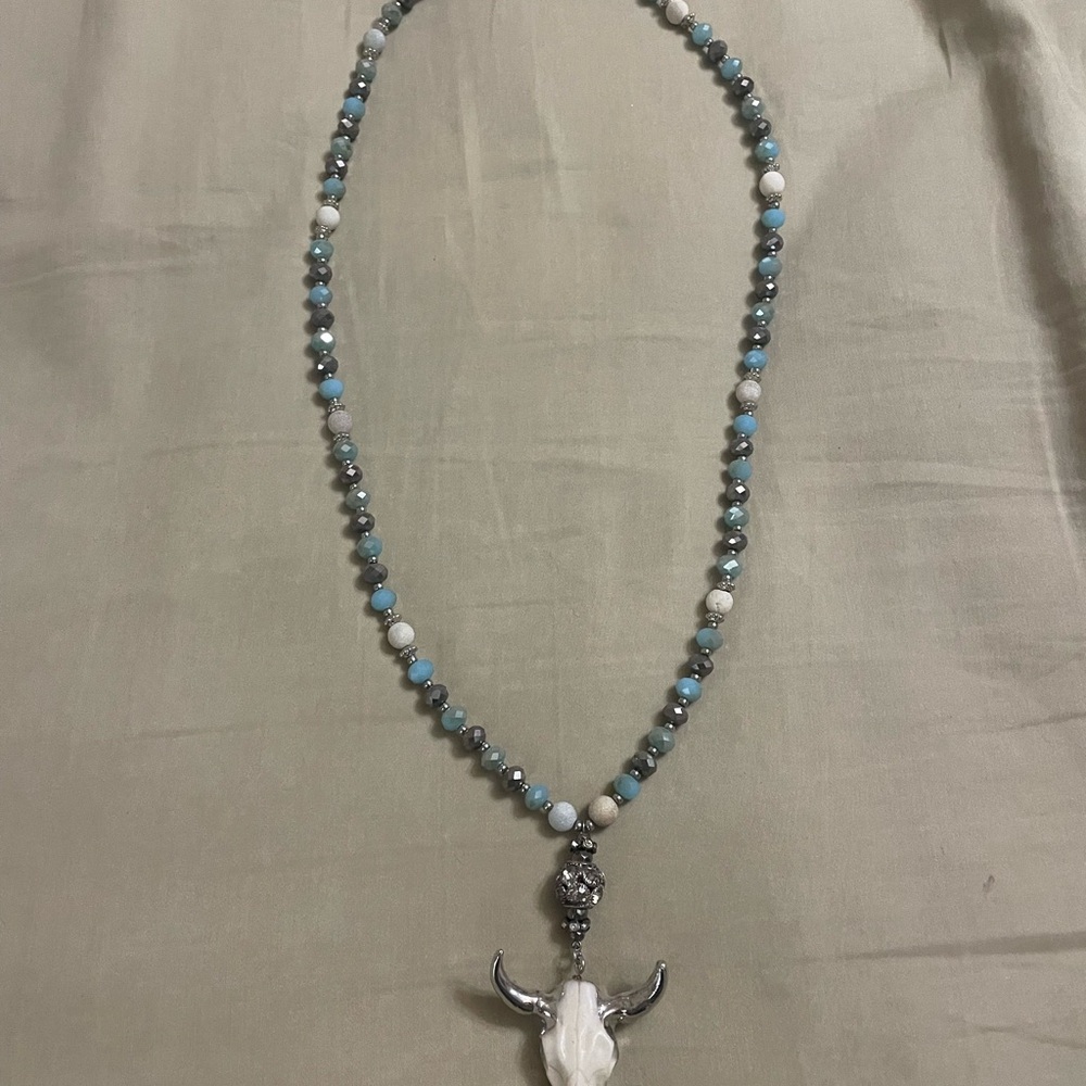 Silver and Blue Beaded Necklace with Bull Pendant